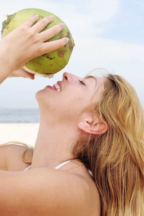 Woman-drinking-coco-water
